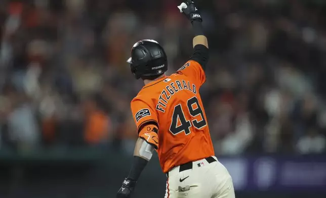 San Francisco Giants' Tyler Fitzgerald runs the bases after hitting a two-run home run against the Colorado Rockies during the sixth inning of a baseball game Friday, July 26, 2024, in San Francisco. (AP Photo/Godofredo A. Vásquez)