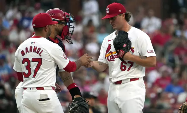 St. Louis Cardinals starting pitcher Gordon Graceffo (67) is removed by manager Oliver Marmol (37) during the fourth inning in the second game of a baseball doubleheader against the Kansas City Royals Wednesday, July 10, 2024, in St. Louis. (AP Photo/Jeff Roberson)