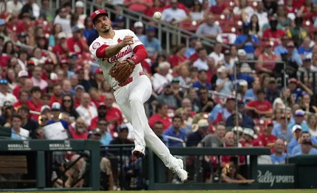 St. Louis Cardinals third baseman Nolan Arenado throws out Kansas City Royals' Freddy Fermin during the third inning in the second game of a baseball doubleheader Wednesday, July 10, 2024, in St. Louis. (AP Photo/Jeff Roberson)