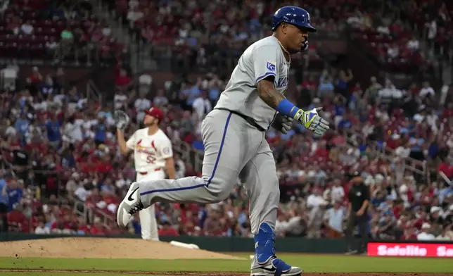 Kansas City Royals' Salvador Perez, right, rounds the bases after hitting a solo home run off St. Louis Cardinals relief pitcher Matthew Liberatore during the sixth inning in the second game of a baseball doubleheader Wednesday, July 10, 2024, in St. Louis. (AP Photo/Jeff Roberson)