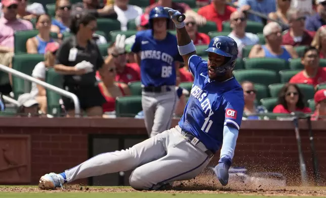 Kansas City Royals' Maikel Garcia scores during the eighth inning in the first game of a baseball doubleheader against the St. Louis Cardinals Wednesday, July 10, 2024, in St. Louis. (AP Photo/Jeff Roberson)