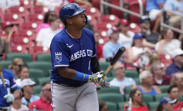 Kansas City Royals' Salvador Perez watches his solo home run during the sixth inning in the first game of a baseball doubleheader against the St. Louis Cardinals Wednesday, July 10, 2024, in St. Louis. (AP Photo/Jeff Roberson)