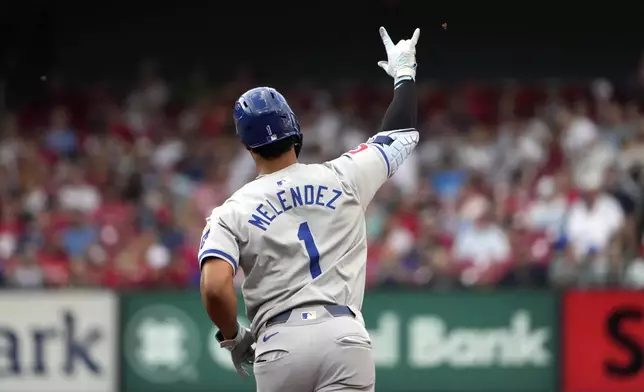 Kansas City Royals' MJ Melendez celebrates as he rounds the bases after hitting a solo home run during the third inning in the second game of a baseball doubleheader against the St. Louis Cardinals Wednesday, July 10, 2024, in St. Louis. (AP Photo/Jeff Roberson)