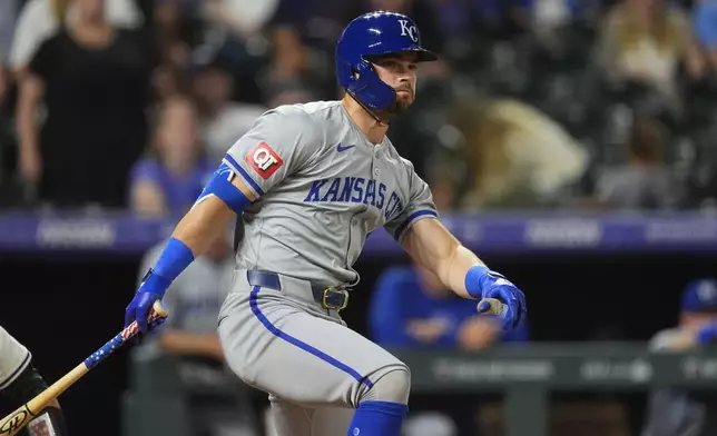 Kansas City Royals pinch-hitter Michael Massey grounds out against Colorado Rockies relief pitcher Victor Vodnik to end a baseball game Saturday, July 6, 2024, in Denver. (AP Photo/David Zalubowski)