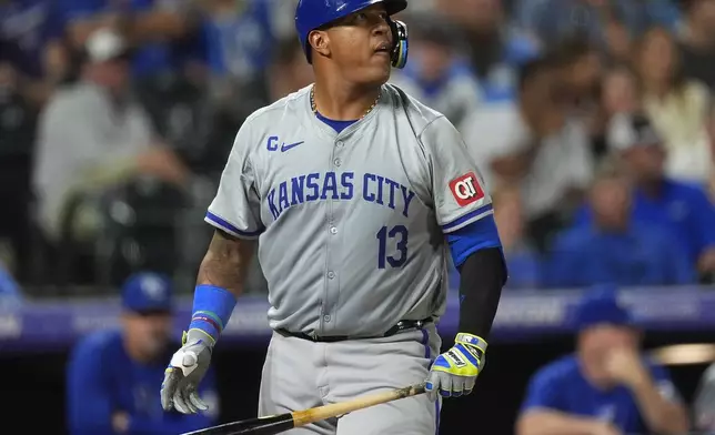 Kansas City Royals' Salvador Perez reacts after striking out against Colorado Rockies relief pitcher Victor Vodnik in the ninth inning of a baseball game Saturday, July 6, 2024, in Denver. (AP Photo/David Zalubowski)