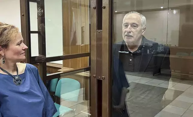 FILE - In this photo released by the Moscow City Court Press Service, Valery Golubkin, a physicist specializing in aerodynamics, stands in a defendant’s cage in court in Moscow, Russia, on Monday, June 26, 2023. Golubkin, 71, was arrested in 2021 and convicted of treason in 2023 and sentenced to 12 years in prison. Authorities accused him of passing state secrets abroad, but he and his lawyers insisted that he merely submitted research reports on an international project that didn’t contain any state secrets and were cleared for submission. (Moscow City Court Press Service via AP, File)