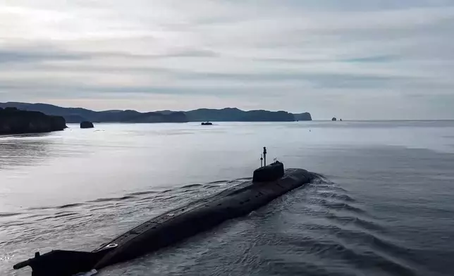 FILE - In this photo taken from video released by the Russian Defense Ministry on April 14, 2023, a Russian nuclear submarine sails off to take part in the Pacific Fleet drills near Vladivostok, Russia. Ever since sending troops into Ukraine on Feb. 24, 2022. (Russian Defense Ministry Press Service via AP, File)