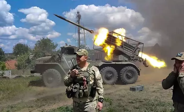 In this photo, taken from video released by the Russian Defense Ministry Press Service on Monday, July 1, 2024, Russian soldiers fire from the BM-21 "Grad" self-propelled 122 mm multiple rocket launcher in an undisclosed location in Ukraine. (Russian Defense Ministry Press Service via AP, File)