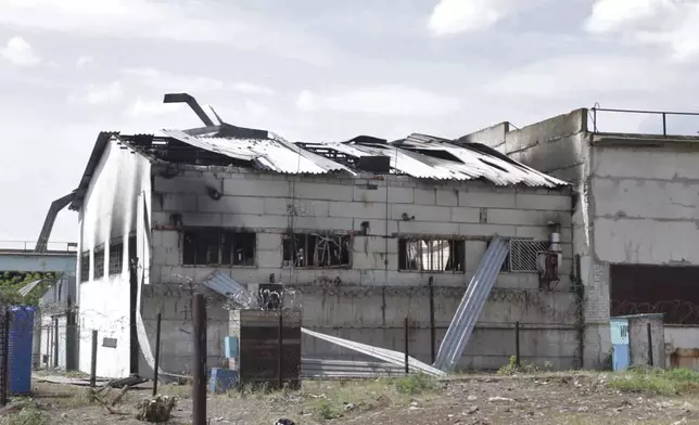 FILE - This image from video shows the damaged barracks at the Russian-controlled Olenivka prison in Olenivka, eastern Ukraine, on July 29, 2022. An AP investigation interviewed survivors, family and investigators and obtained an internal U.N. analysis. All pointed to Russia as the culprit. (AP Photo/File)