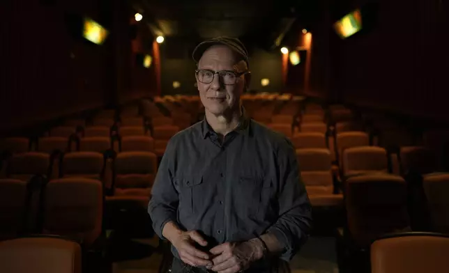 Steve Bognar, Oscar-winning documentarian, is photographed at the Little Art Theatre in Yellow Springs, Ohio, on Monday, April 29, 2024. When the Little Art When the Little Art Theatre set out to land a $100,000 grant to fund a stylish new marquee, the cozy arthouse theater had some talented help. Bognar lives in Yellow Springs, the bohemian Ohio town where the theater's a downtown fixture. (AP Photo/Carolyn Kaster)