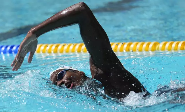 Ziyad Saleem swims while being interviewed in Berkeley, Calif., Tuesday, May 28, 2024. Saleem, a University of California swimmer, is headed to the Paris Olympics to swim for Sudan, his parents' home country and one almost all of his relatives have now fled because of war and a massive humanitarian crisis. (AP Photo/Jeff Chiu)