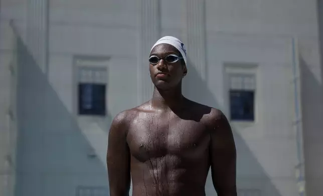 Ziyad Saleem poses in Berkeley, Calif., Tuesday, May 28, 2024. Saleem, a University of California swimmer, is headed to the Paris Olympics to swim for Sudan, his parents' home country and one almost all of his relatives have now fled because of war and a massive humanitarian crisis. (AP Photo/Jeff Chiu)