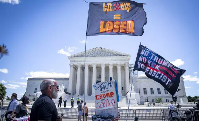 People protest outside of the Supreme Court, Monday, July 1, 2024, after court decisions were announced in Washington. (AP Photo/Jacquelyn Martin)