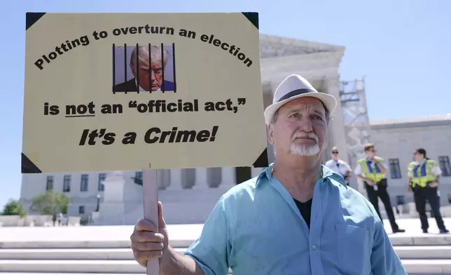 Gary Roush, of College Park, Md., protests outside the Supreme Court Monday, July 1, 2024, in Washington. (AP Photo/Mariam Zuhaib)