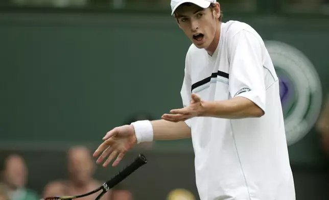 FILE - Britain's Andrew Murray drops his racquet as he disputes a point, during his Men's Singles, third round match against Argentina's David Nalbandian on the Centre Court at Wimbledon, Saturday, June 25, 2005. Murray will play only doubles at his last appearance at the All England Club following his withdrawal from singles after back surgery. (AP Photo/Alastair Grant, File)