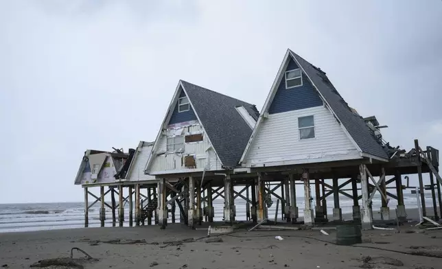 A-frame houses are seen the day after Hurricane Beryl made landfall nearby Tuesday, July 9, 2024, in Surfside Beach, Texas. (Jon Shapley/Houston Chronicle via AP)