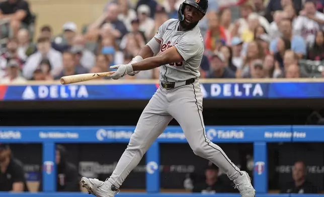 Detroit Tigers' Akil Baddoo strikes out during the second inning of a baseball game against the Minnesota Twins, Tuesday, July 2, 2024, in Minneapolis. (AP Photo/Abbie Parr)