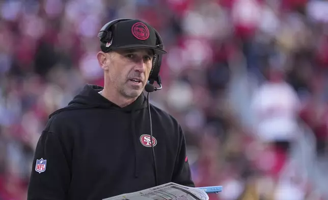 FILE - San Francisco 49ers head coach Kyle Shanahan watches action from the sideline during an NFL football game against the Los Angeles Rams in Santa Clara, Calif., Sunday, Jan. 7, 2024. (AP Photo/Loren Elliott, File)