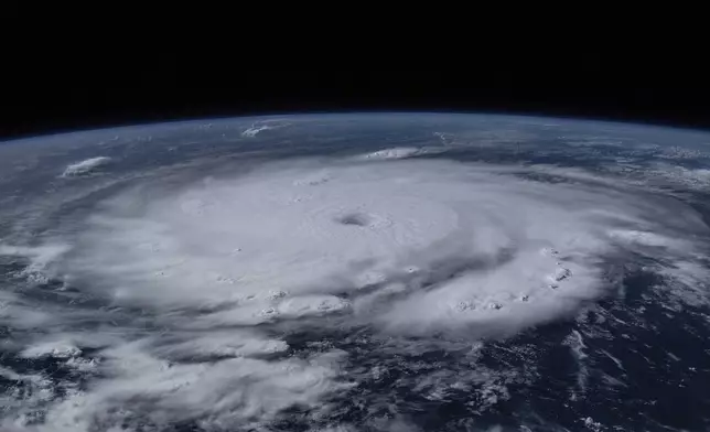This image provided by NASA shows Hurricane Beryl from the International Space Station on Sunday, July 1, 2024. Beryl was roaring toward Jamaica on Wednesday, July 3, with islanders scrambling to make preparations after the powerful Category 4 storm earlier killed at least six people and caused significant damage in the southeast Caribbean. (NASA via AP)