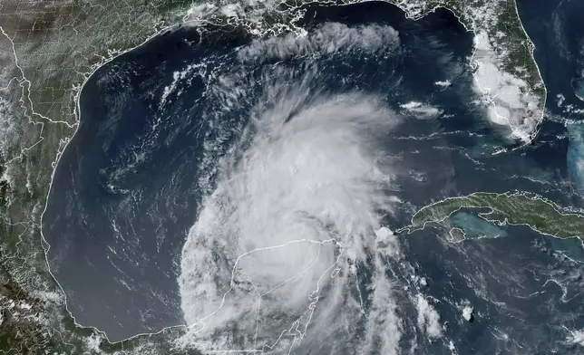 This GOES-16 GeoColor satellite image taken at 4:16 p.m. EDT on Friday, July 5, 2024, and provided by NOAA, shows Hurricane Beryl over Mexico’s Yucatan Peninsula. Texas officials urged coastal residents to prepare as the storm moves toward the Gulf of Mexico. (NOAA via AP)