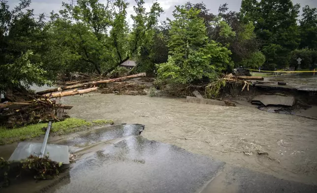 Debris and damaged along the Winooski River following flooding caused by the remnants of Hurricane Beryl, Thursday, July 11, 2024, in Plainfield, Vt. (AP Photo/Dmitry Belyakov)