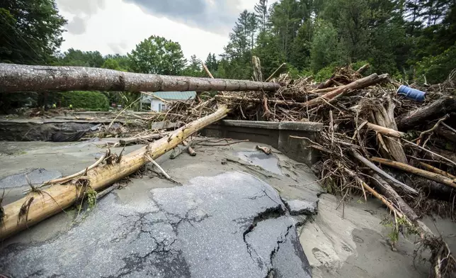 Debris is strewn about following flooding caused by the remnants of Hurricane Beryl, Thursday, July 11, 2024, in Plainfield, Vt. (AP Photo/Dmitry Belyakov)