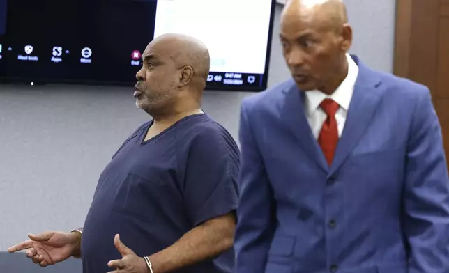 Duane "Keffe D" Davis, who is accused of orchestrating the 1996 slaying of hip-hop icon Tupac Shakur, addresses the court as his attorney Carl Arnold, right, walks away during a hearing to reconsider his bond at the Regional Justice Center, on Tuesday, July. 23, 2024, in Las Vegas. (Bizuayehu Tesfaye/Las Vegas Review-Journal via AP)