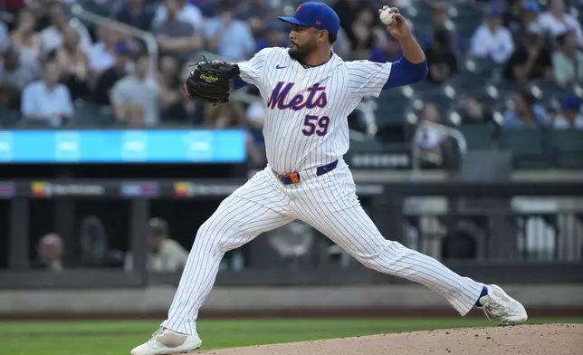 New York Mets' Sean Manaea pitches during the first inning of a baseball game against the Minnesota Twins, Tuesday, July 30, 2024, in New York. (AP Photo/Pamela Smith)