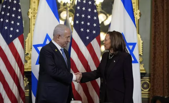 Vice President Kamala Harris, right, shakes hands with Israeli Prime Minister Benjamin Netanyahu before a meeting at the Eisenhower Executive Office Building on the White House complex in Washington, Thursday, July 25, 2024. (AP Photo/Julia Nikhinson)