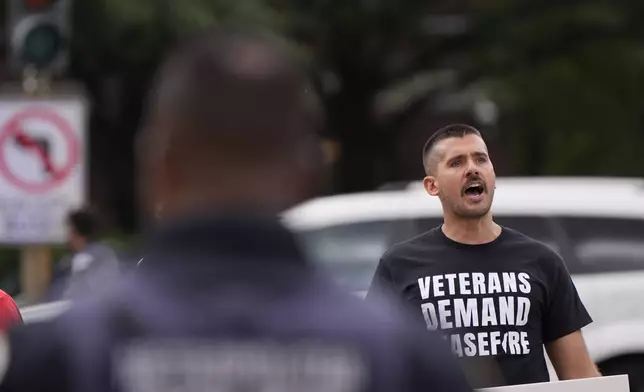 Protestors block traffic, Wednesday, July 24, 2024, in Washington, ahead of a scheduled visit by Israeli Prime Minister Benjamin Netanyahu at the U.S. Capitol. (AP Photo/Mike Stewart)