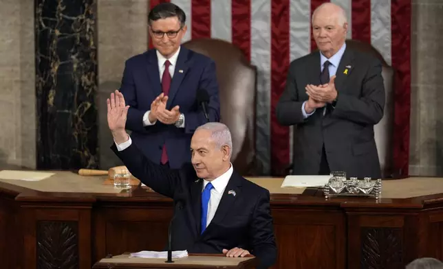 Israeli Prime Minister Benjamin Netanyahu speaks to a joint meeting of Congress at the Capitol in Washington, Wednesday, July 24, 2024, as House Speaker Mike Johnson of La., and Senate Foreign Relations Chair Ben Cardin, D-Md., listen. (AP Photo/Julia Nikhinson)