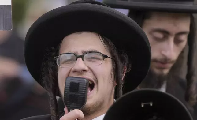 Hasidic Jews are seen protesting against Netanyahu polices towards the Palestinians, near the U.S. Capitol ahead of a scheduled visit by Israeli Prime Minister Benjamin Netanyahu, Wednesday, July 24, 2024, in Washington. (AP Photo/Mike Stewart)