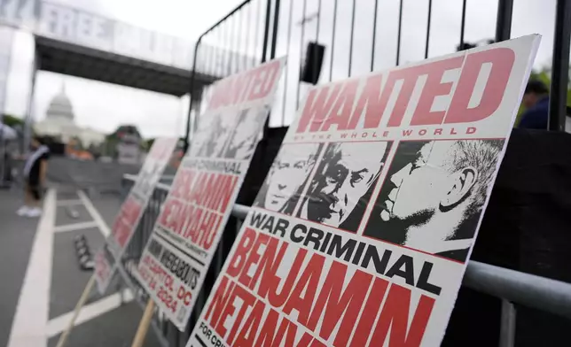 Protest signage against Benjamin Netanyahu is seen near the U.S. Capitol ahead of a scheduled visit by Israeli Prime Minister Benjamin Netanyahu, Wednesday, July 24, 2024, in Washington. (AP Photo/Mike Stewart)