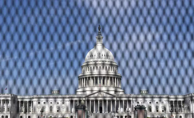 The U.S. Capitol is seen behind a security fence a day before of Israel's Prime Minister Benjamin Netanyahu visit to Capitol Hill, Tuesday, July 23, 2024, in Washington. ( AP Photo/Jose Luis Magana)