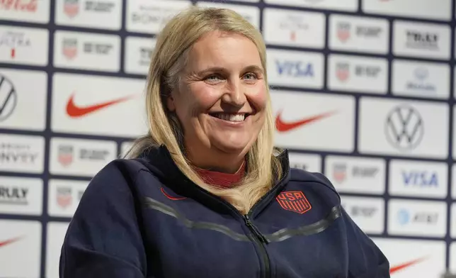 Emma Hayes, head coach of the United States women's soccer team, smiles during an olympics news conference in New York, Monday, July 8, 2024. (AP Photo/Seth Wenig)