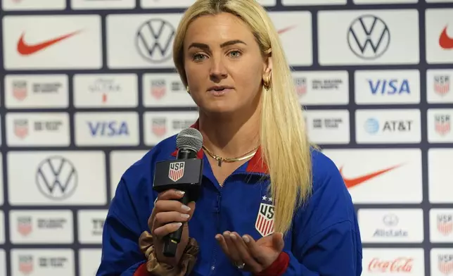 Lindsey Horan, captain of the United States women's soccer team, speaks during an olympics news conference in New York, Monday, July 8, 2024. (AP Photo/Seth Wenig)