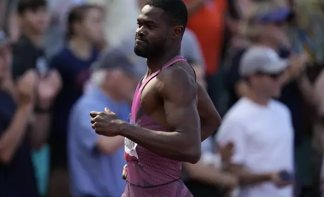 Rai Benjamin runs the men's 400-meter hurdles final during the U.S. Track and Field Olympic Team Trials, Sunday, June 30, 2024, in Eugene, Ore. (AP Photo/Charlie Neibergall)