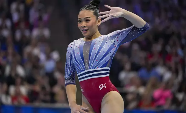 Suni Lee competes in the floor exercise at the United States Gymnastics Olympic Trials on Sunday, June 30, 2024, in Minneapolis. (AP Photo/Charlie Riedel)
