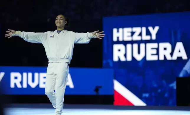 Hezly Rivera is introduced at the United States Gymnastics Olympic Trials on Friday, June 28, 2024 in Minneapolis. (AP Photo/Charlie Riedel)