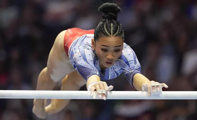 Suni Lee competes on the uneven bars at the United States Gymnastics Olympic Trials on Sunday, June 30, 2024, in Minneapolis. (AP Photo/Abbie Parr)