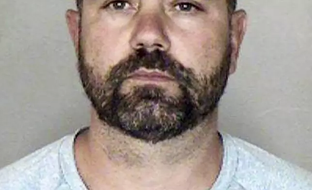 FILE - This photo provided by the Butte County District Attorney shows Ronnie Dean Stout II of Chico, Calif. Stout was charged with arson, for allegedly starting the Park Fire, during his first court appearance Monday, July 29, 2024. (Butte County District Attorney via AP, File)