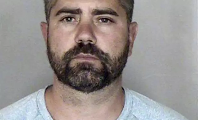 This photo provided by the Butte County District Attorney shows Ronnie Dean Stout II, 42, of Chico, Calif. Stout was arrested early Thursday, July 25, 2024, by Cal Fire arson investigators, assisted by District Attorney investigators, on suspicion of starting the Park Fire. (Butte County District Attorney via AP)