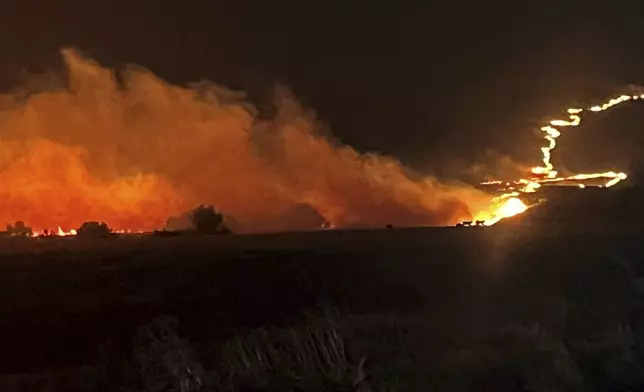 This photo provided by the Oregon Department of Transportation shows the Durkee Fire burning in eastern Ore., Monday, July 22, 2024. (Oregon Department of Transportation via AP)