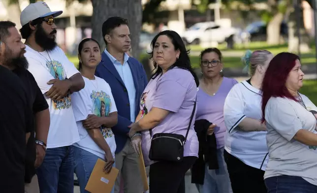 Families of the victims in the Uvalde elementary school shooting file out of the Uvalde County Courthouse where former Uvalde Consolidated Independent School District police officer Adrian Gonzales appeared to face charges of abandoning and failing to protect children, Thursday, July 25, 2024, in Uvalde, Texas. (AP Photo/Eric Gay)