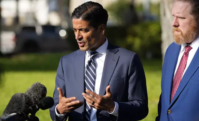 Nico LaHood left, attorney for former Uvalde Consolidated Independent School District police officer Adrian Gonzales, speaks with the media outside the Uvalde County Courthouse after Gonzales pleaded not guilty during a court appearance., Thursday, July 25, 2024, in Uvalde, Texas. (AP Photo/Eric Gay)