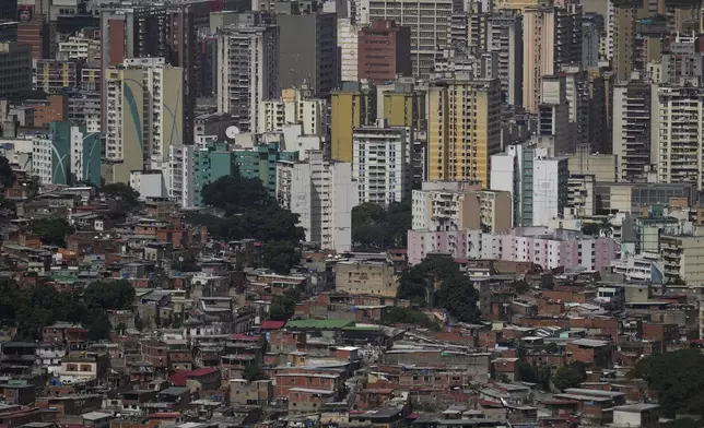 An aerial view of the Guarataro neighborhood of Caracas, Venezuela, Saturday, July 27, 2024. Voters head to the polls on July 28 to decide on whether to reelect President Nicolas Maduro for a third term. (AP Photo/Matias Delacroix)