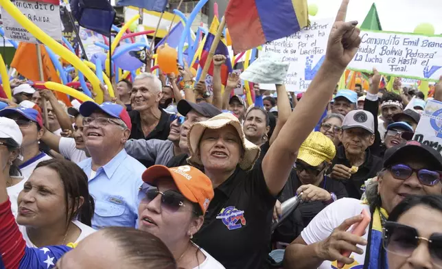 Supporters of opposition presidential candidate Edmundo Gonzalez get revved up as they wait for his arrival at a campaign rally in Barinas, Venezuela, Saturday, July 6, 2024. The official campaign period for the July 28 election kicked off on July 4. (AP Photo/Ariana Cubillos)