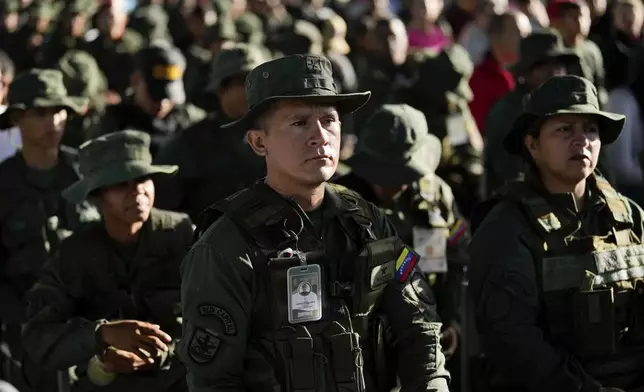 Military personnel wait for their turn to vote in the presidential elections at Fort Tiuna in Caracas, Venezuela, Sunday, July 28, 2024. (AP Photo/Fernando Vergara)