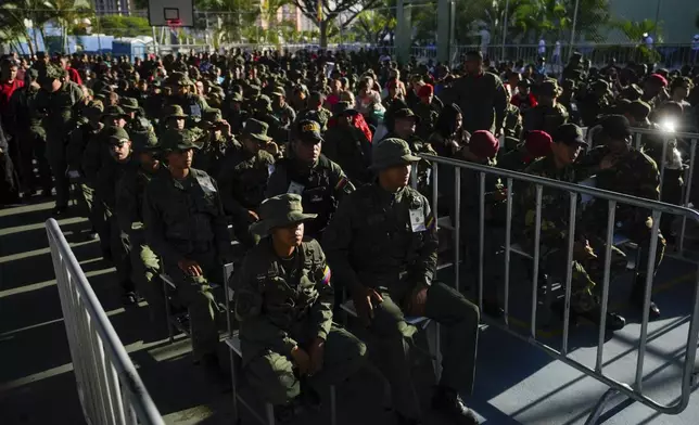 Military personnel wait for their turn to vote in the presidential elections at Fort Tiuna in Caracas, Venezuela, Sunday, July 28, 2024. (AP Photo/Fernando Vergara)