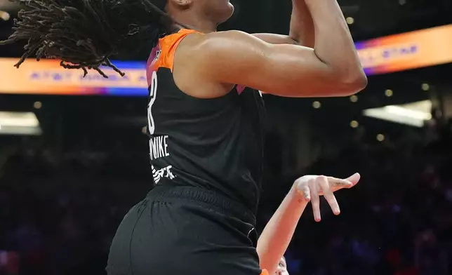 Nneka Ogwumike, of Team WNBA, goes up to score against Team USA during the second half of a WNBA All-Star basketball game Saturday, July 20, 2024, in Phoenix. (AP Photo/Ross D. Franklin)